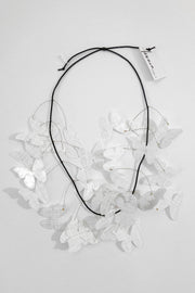 Takara Short Butterfly Kinetic Necklace White Crosshatch