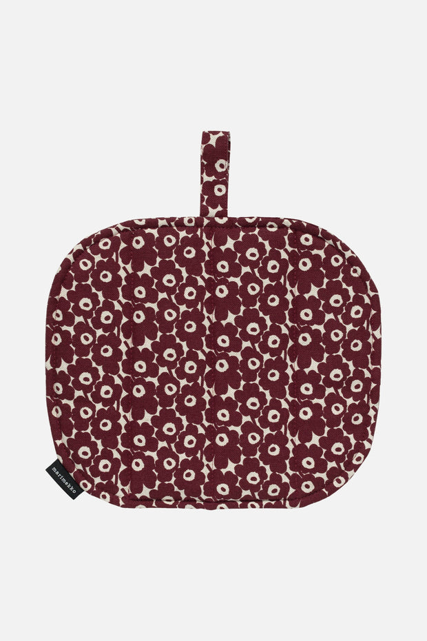 Floral-patterned pot holder on a white background