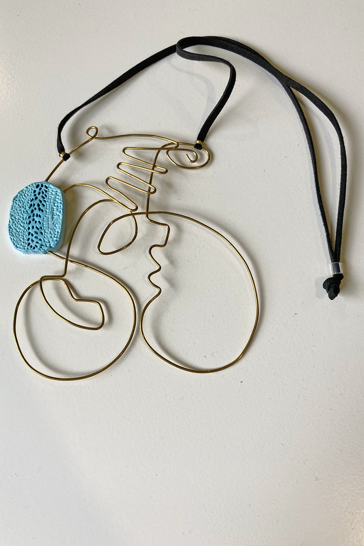 Radhika Sanghvi Face Necklace